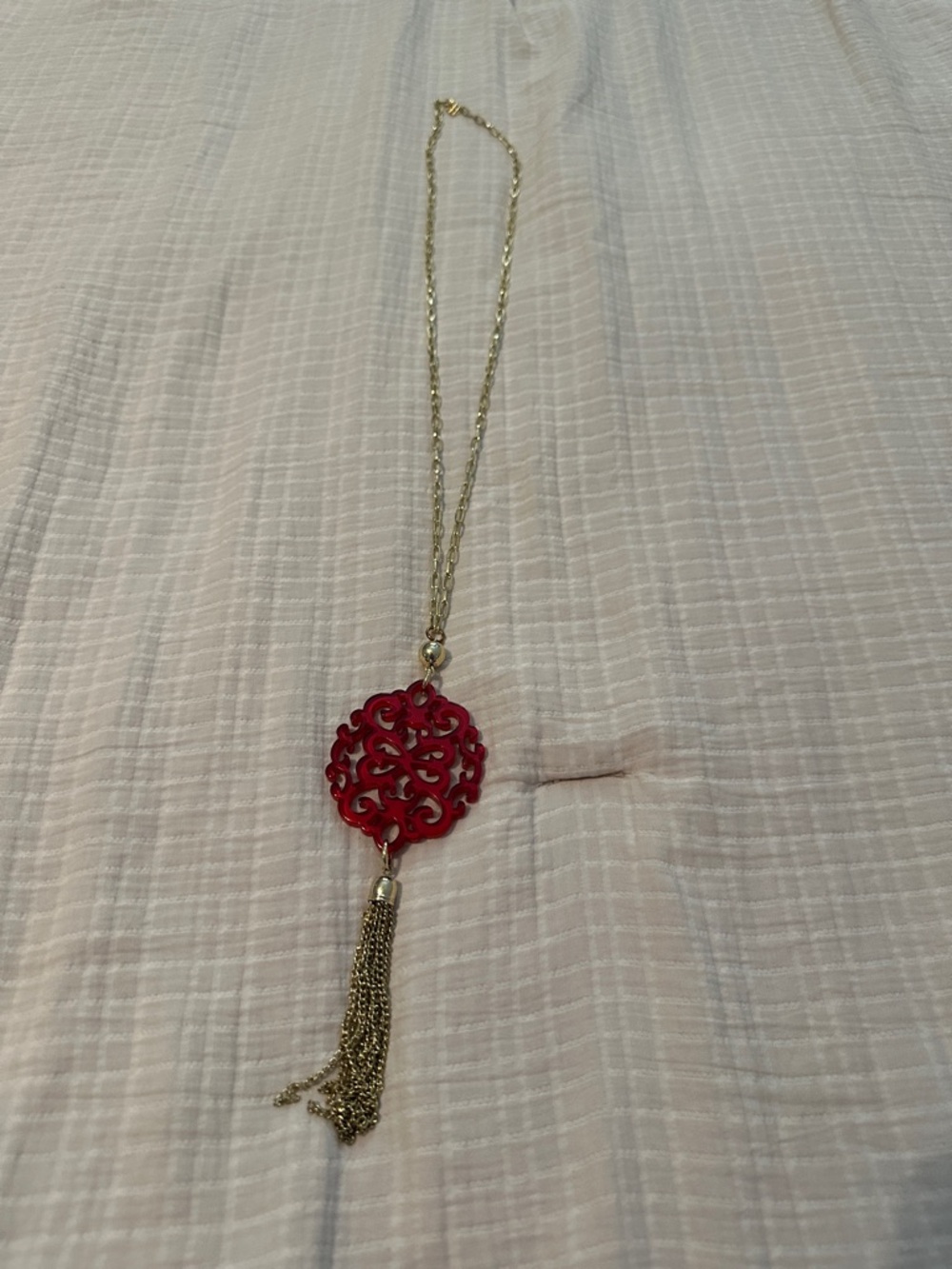 Gold-Tone Chain Necklace with Red Filigree Pendant and Tassel Accent